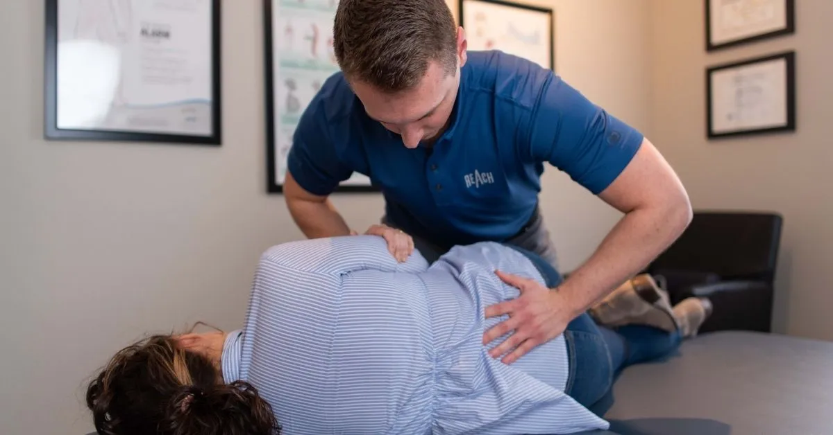 Chiropractic care for back pain at REACH Rehab + Chiropractic in Plymouth, MI
